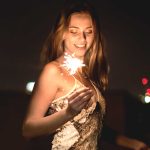 A Young Woman In A Sequined Dress Dancing On A Roo XTBNB3Q 150x150