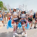 Women posing during Cayman Carnival